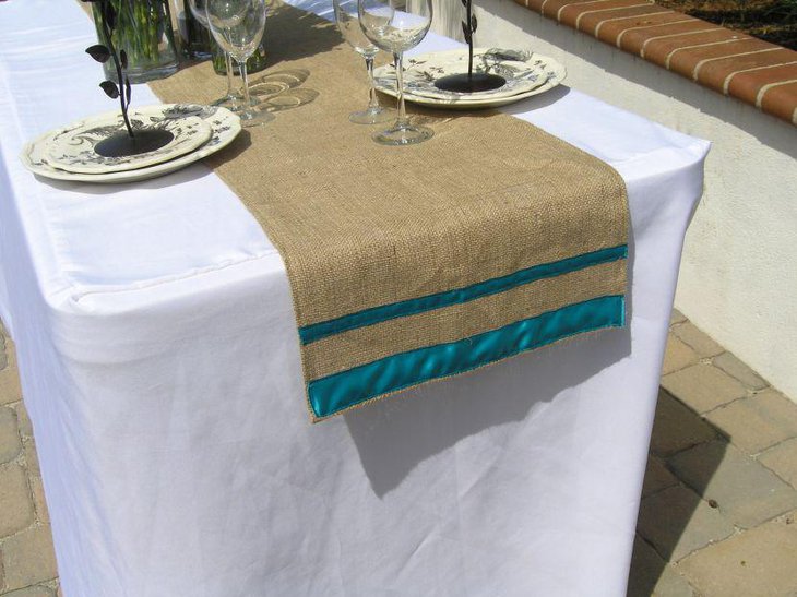 Stunning DIY table runner with blue ribbon