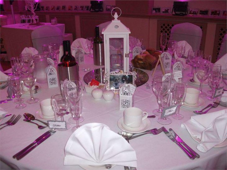Stunning lantern centerpiece on wedding breakfast table