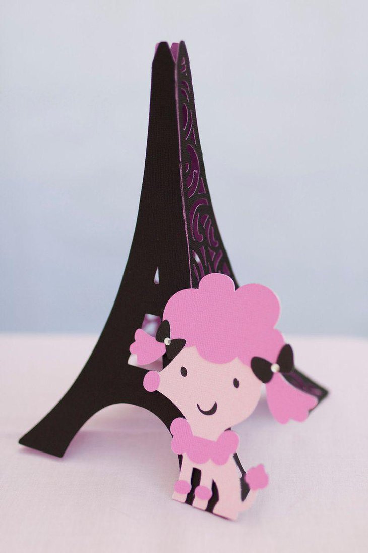 Stunning paper poodle decoration on a miniature Eiffel Tower