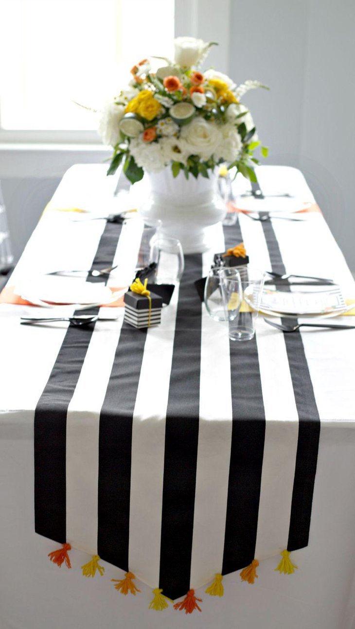 Stylish Black and White Striped Wedding Table Runner With Orange and Yellow Tassels