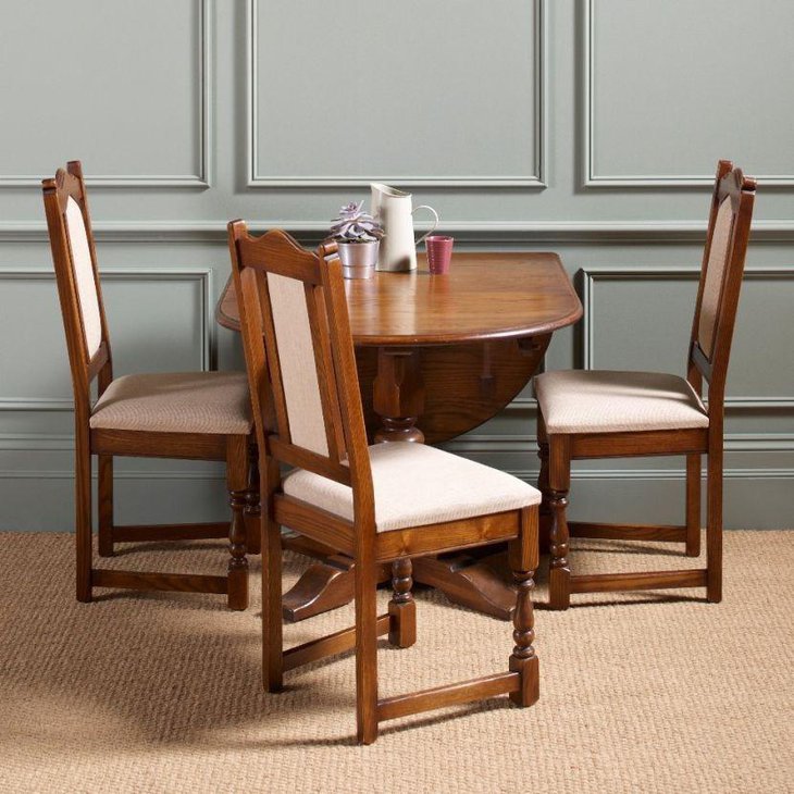 Stylish drop leaf dining table set with white upholstery