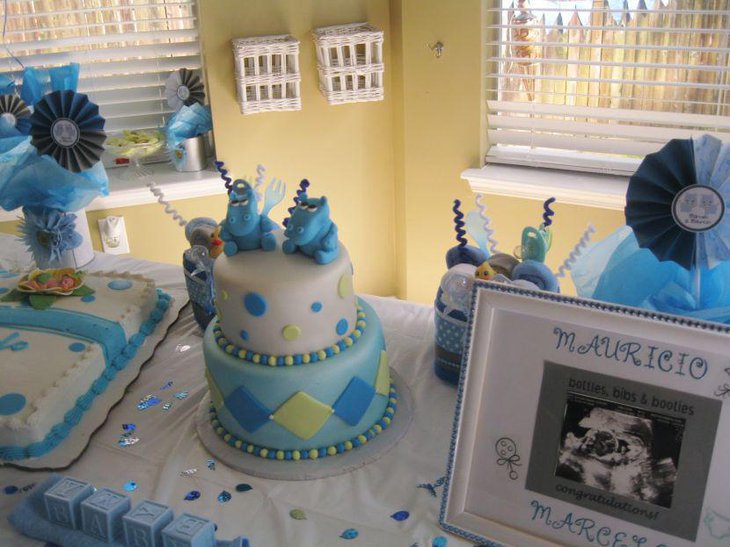 Sweet blue accented twin baby shower table decor