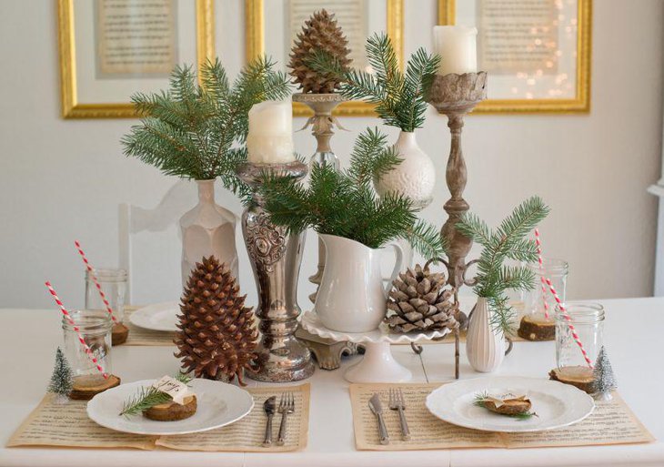 This DIY Christmas table is decked with pine cones mason jars and candles