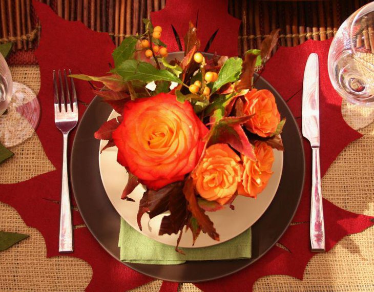Trendy Thanksgiving Decor With Bright Red Maple Leaf Mat And Floral Arrangement
