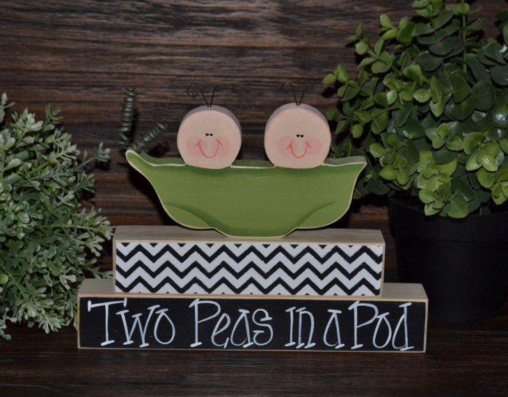 Two peas in a pod themed twin baby shower table