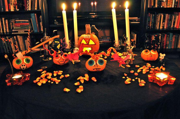 Unique Jack O Lantern and pumpkins as Halloween table centerpieces