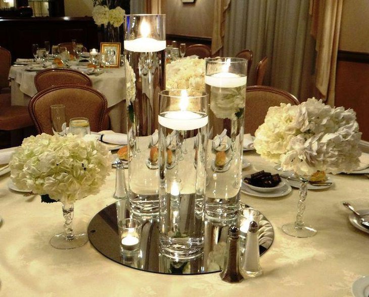 Unique winter party table decorations with floating candle centerpieces