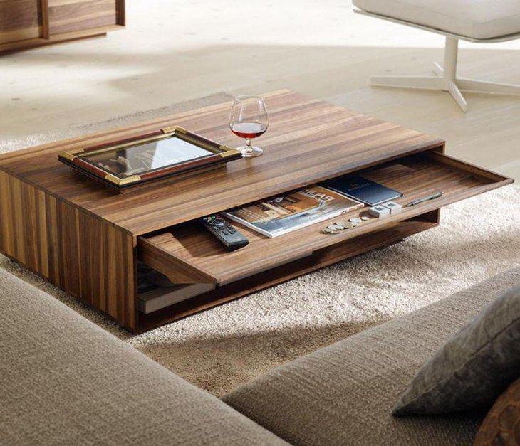 Unique wooden coffee table with a slider for storage