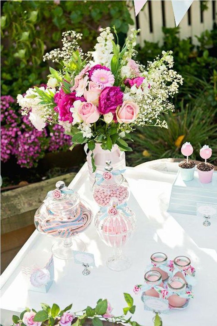 Victorian garden party table decor with cute vases