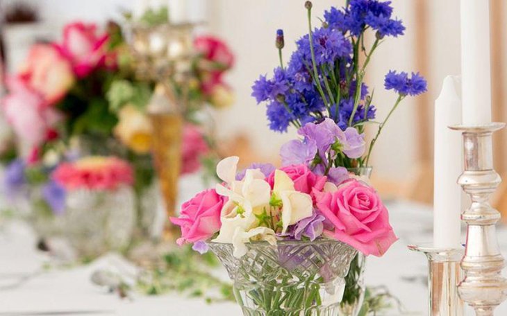Vintage purple and pink floral wedding table decor