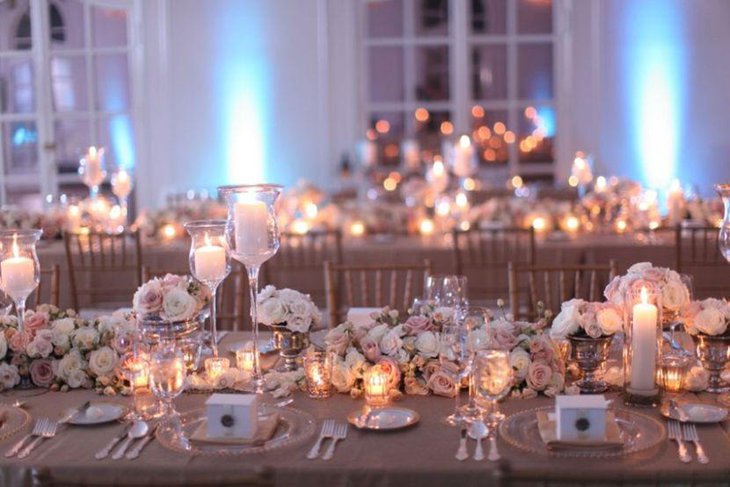Vintage wedding table decor with silver vases