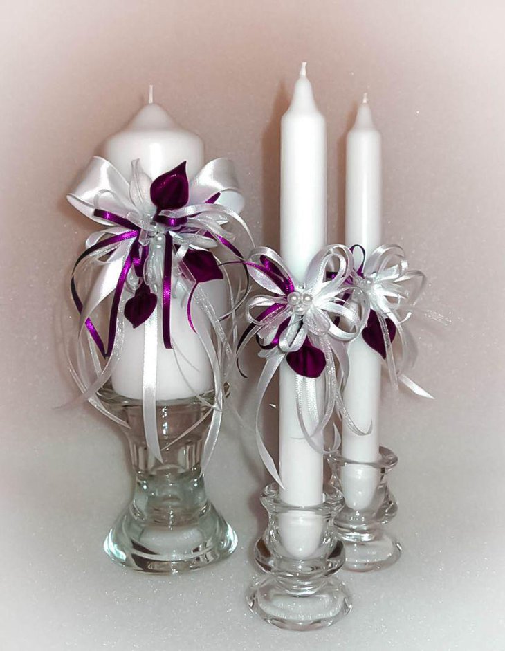 Wedding table decor with handmade white and deep purple unity candles