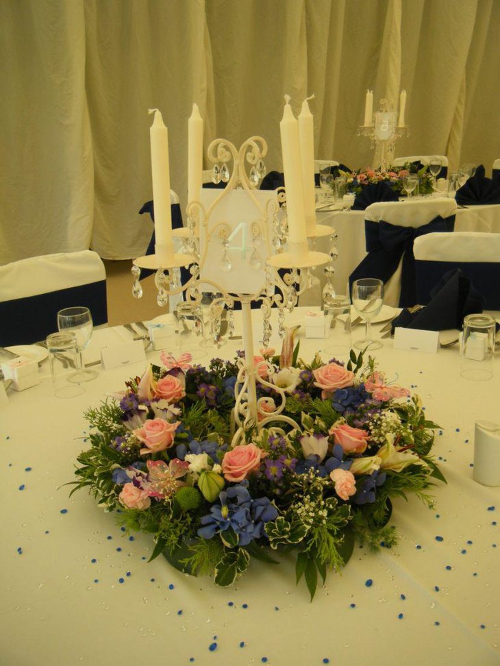 Wedding table decor with vintage candelabra and flowers