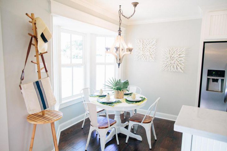 White themed breakfast nook with loads of natural lighting