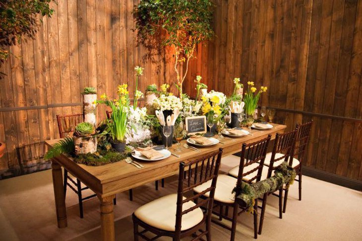 Wonderful spring Italian table decorated with greens