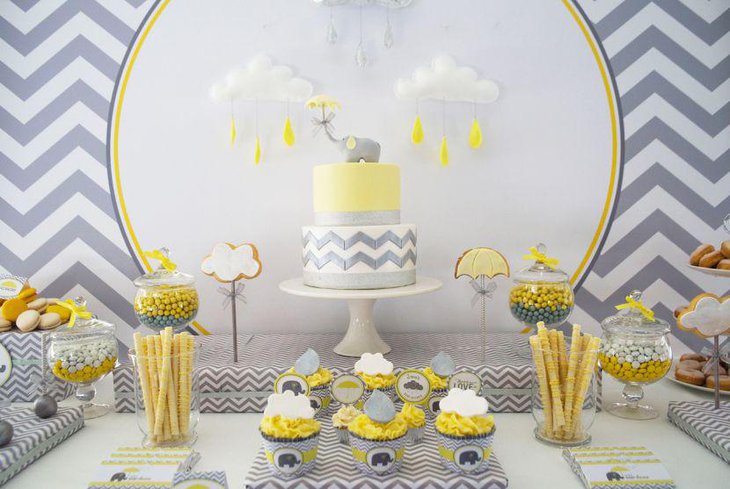 Yellow candies display on elephant themed baby shower candy table
