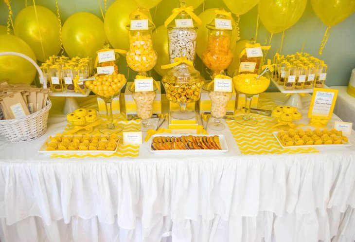Yellow themed buffet spread for baby shower