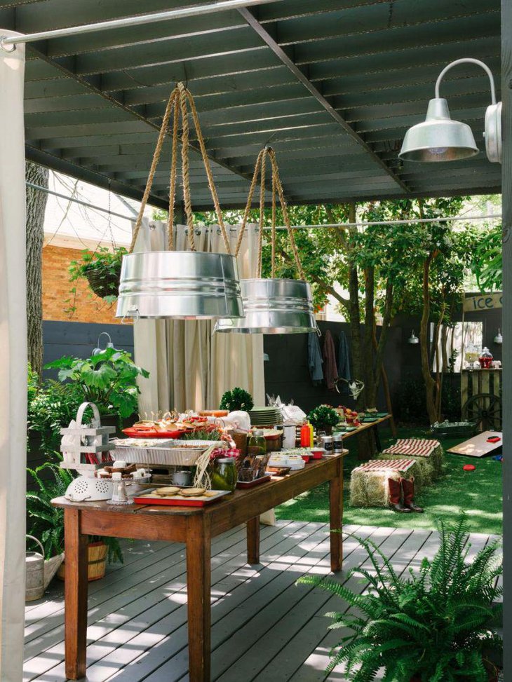 A backyard bridal shower table decked up with rustic tones