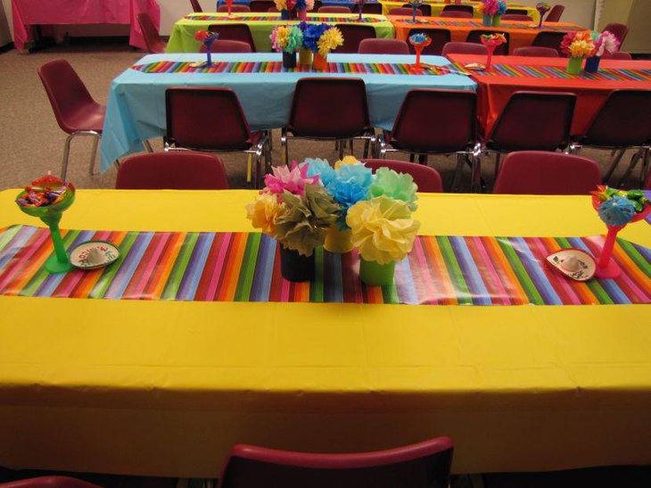 A colourful serape embellishes this Mexican party table