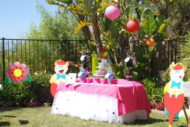 A cute Mad Hatter tea party birthday table for spring