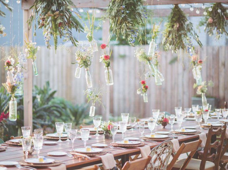 A floral themed outdoor bridal shower table