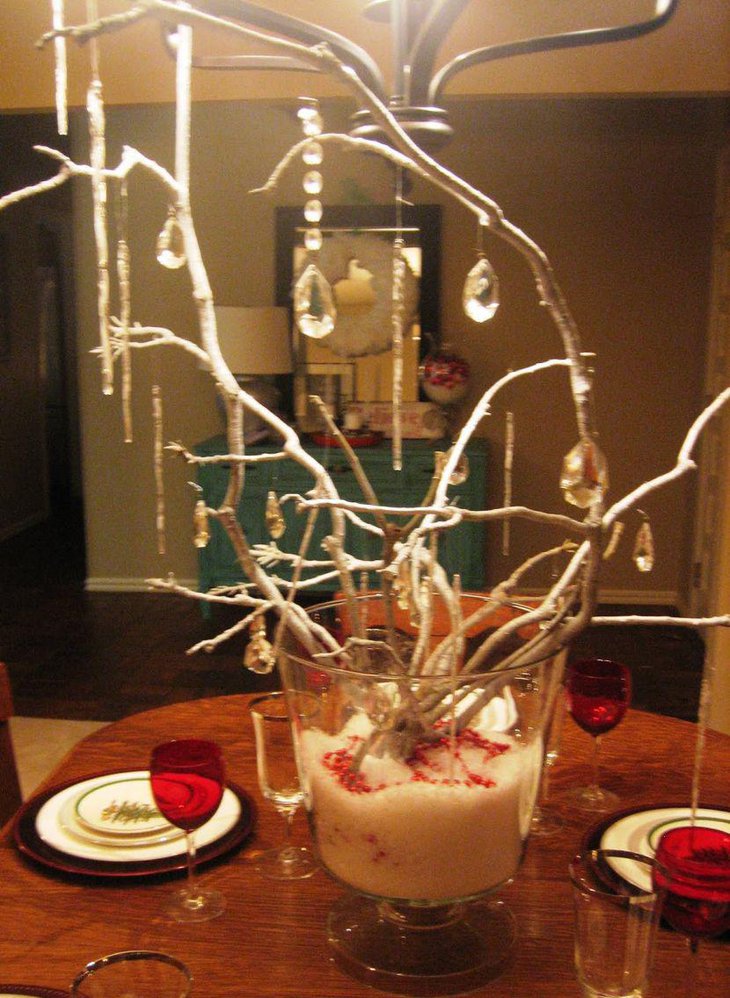A jar with branch centerpiece embellished on this christmas table