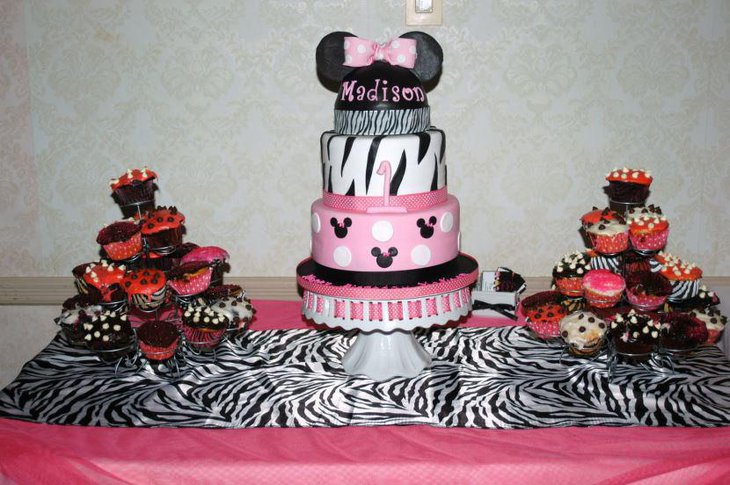 A Minnie Mouse cake adorned with black stripes