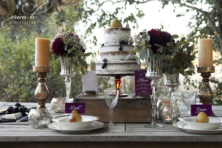 A rustic outdoor bridal shower party table