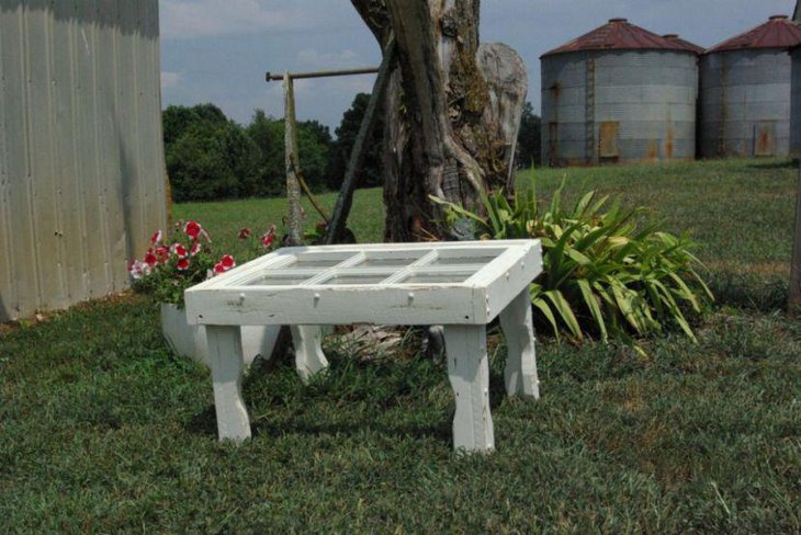 A smart looking white coffee table with rustic accents