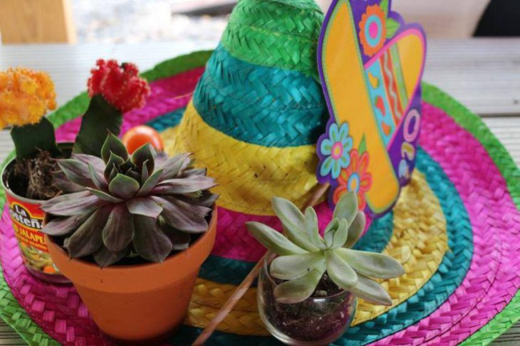 A sombrero centerpiece decked up with succulents