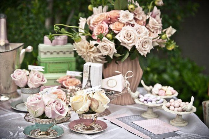 A vintage tea party themed outdoor bridal shower table