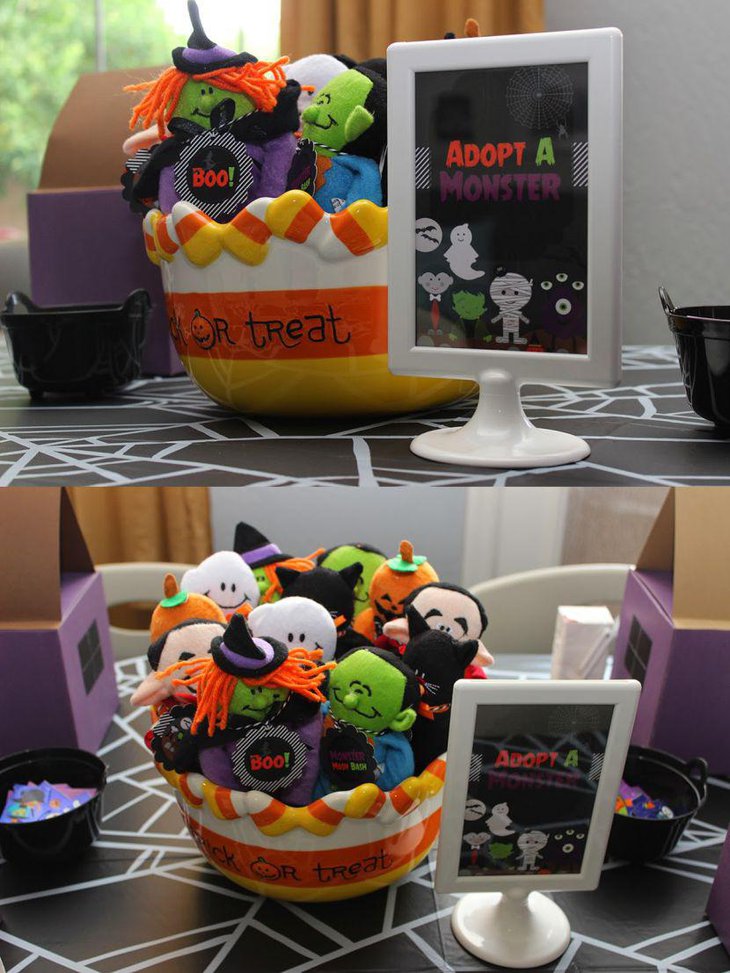 Adopt a monster bowl centerpiece for kids Halloween party table