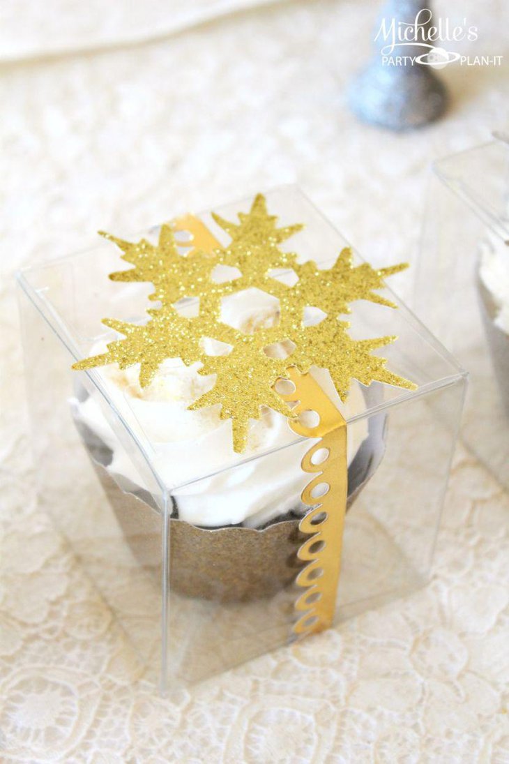 Alluring Christmas cupcake wrapped with golden snowflake