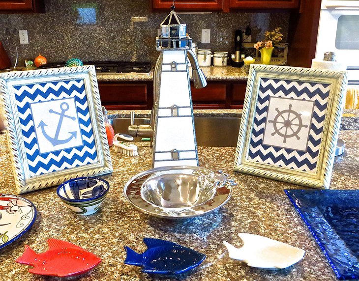 Amazing nautical themed baby shower decor with lighthouse