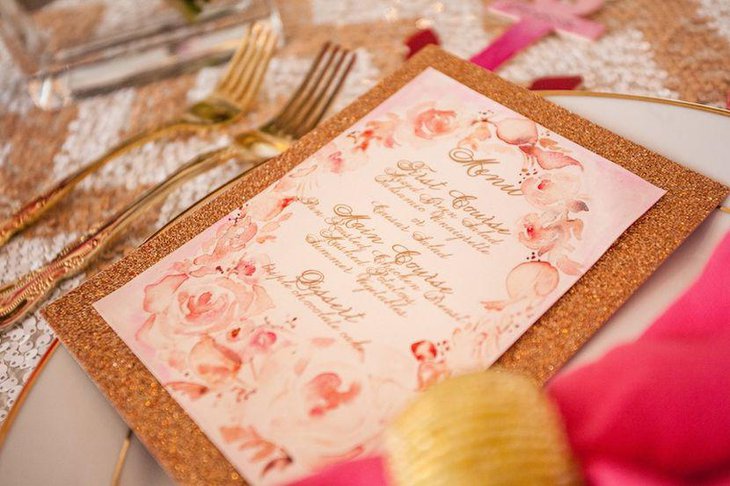 Amazing wedding table decor with golden accented menu card