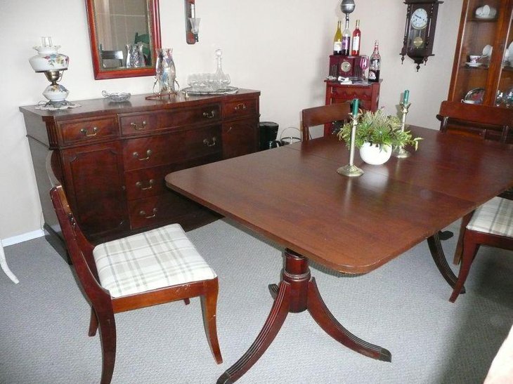 Antique Duncan Phyfe drop leaf dining table set with four chairs
