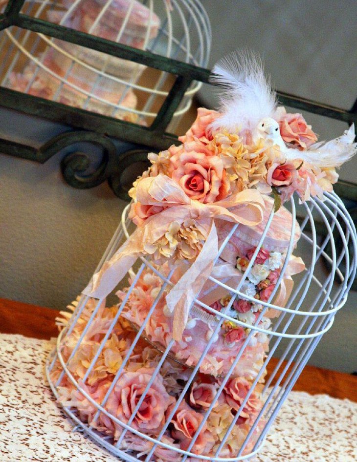 Attractive wedding white birdcage centerpiece