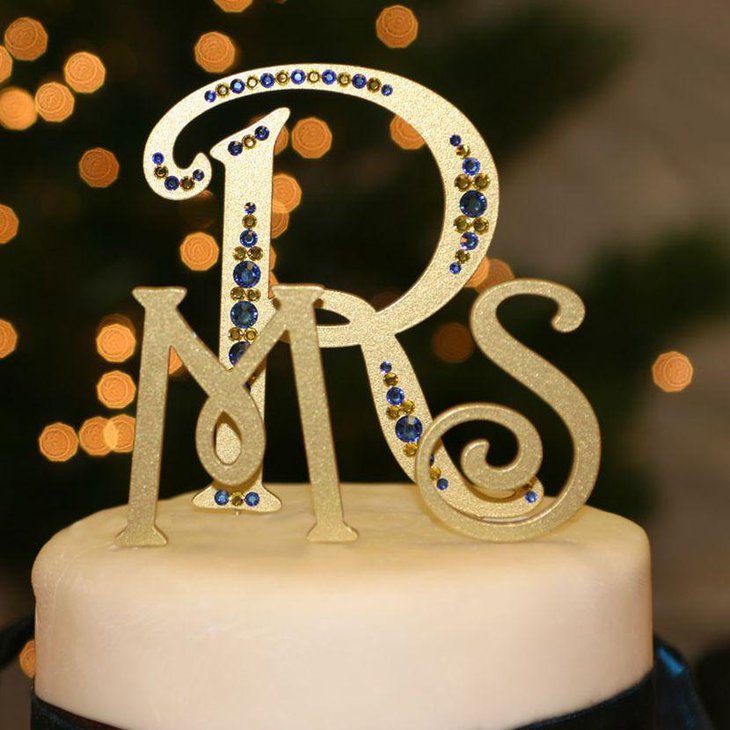 Awesome golden monogram cake topper decor