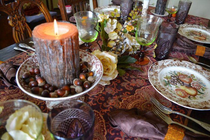 Bark Candle With Fake Acorns As Table Centerpiece