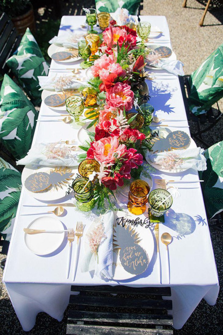 Beautiful and colorful flower arrangement on outdoor party table