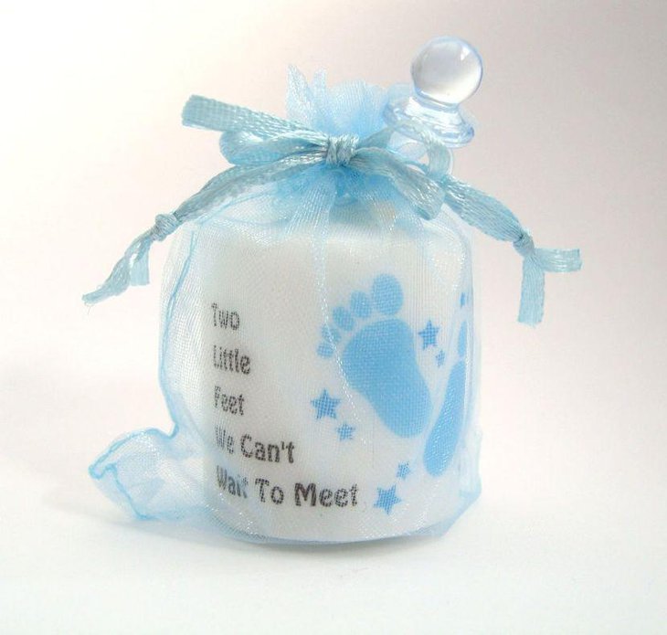 Beautiful blue and white baby shower candle favor with baby footprints