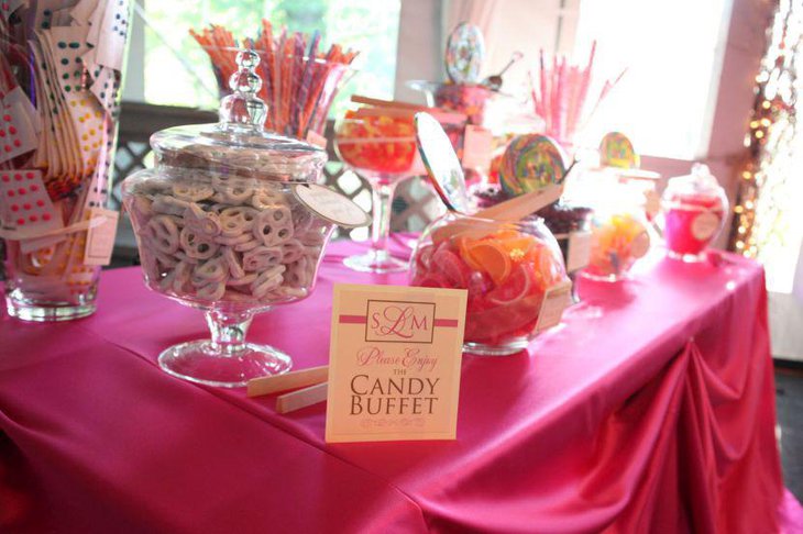 Beautiful DIY wedding candy table idea with pink and white accents