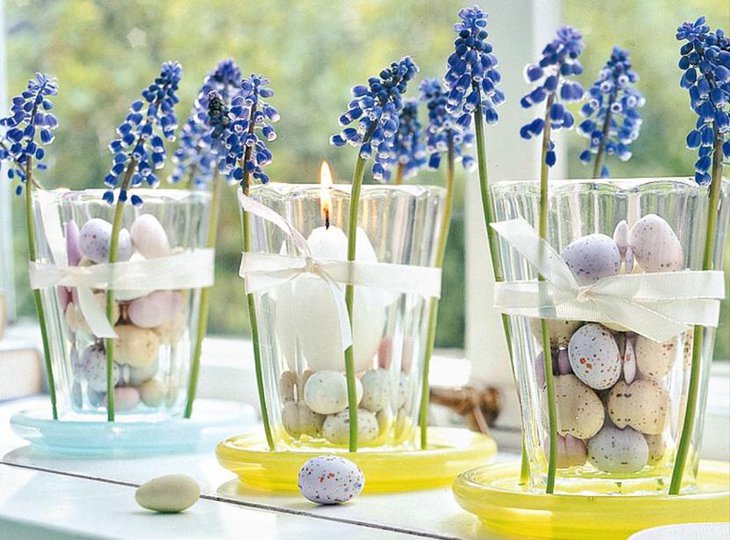 Beautiful Easter Table Centerpiece with Eggs Flowers and Candles