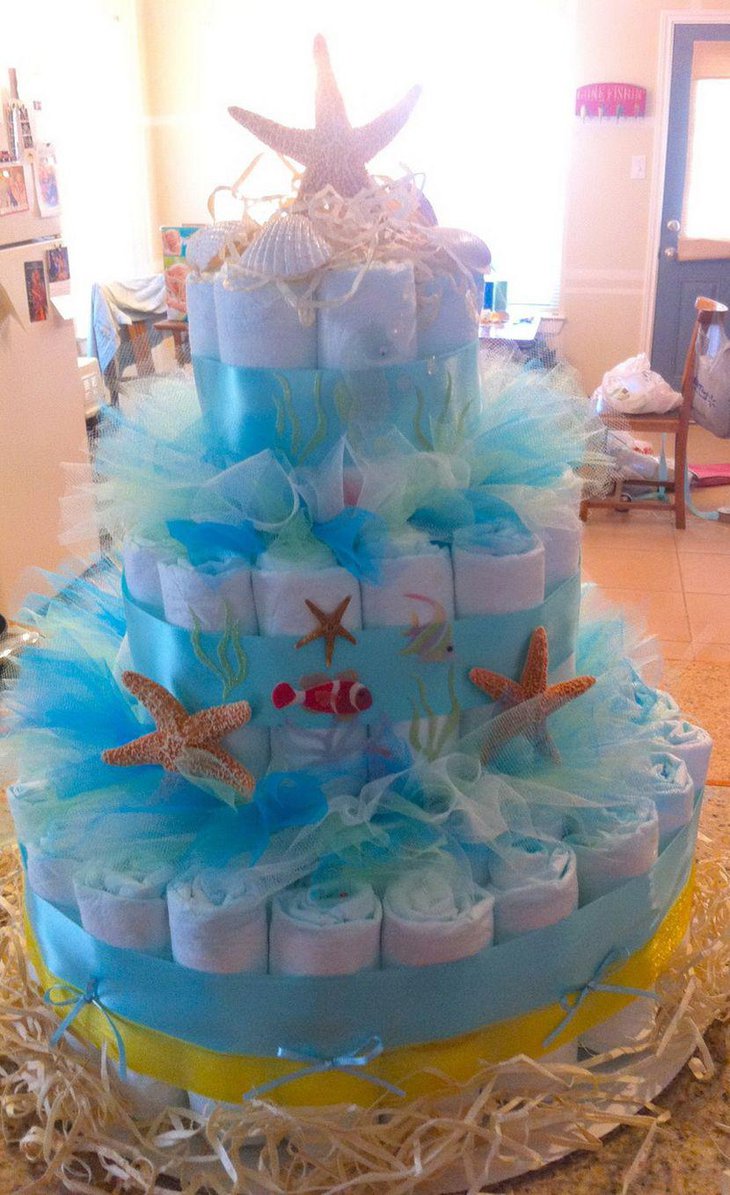 Beautiful mermaid baby shower ideas with DIY diaper cake decor