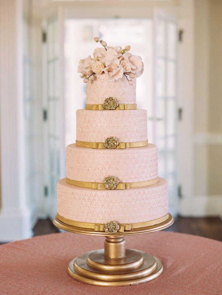 Beautiful wedding cake decoration in golden accents