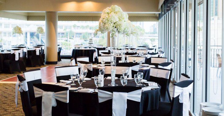 Black and white wedding table with white floral centerpiece