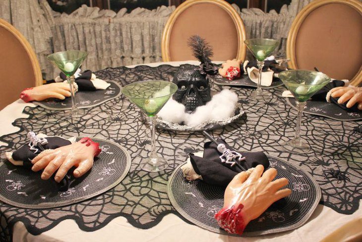 Black skull on a silver tray as Halloween centerpiece