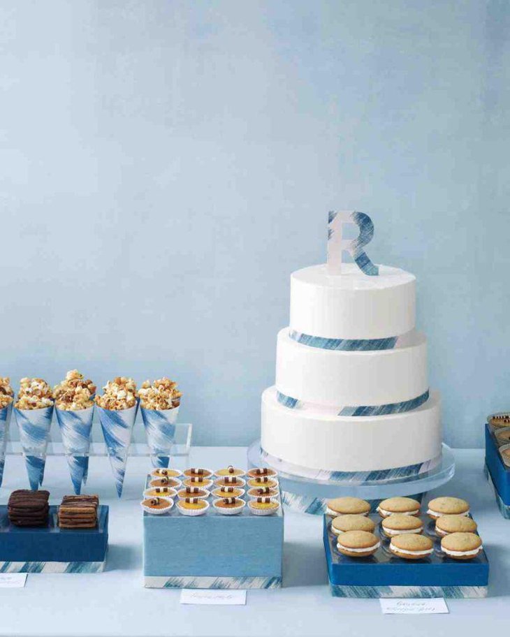 Blue accented bridal shower dessert table