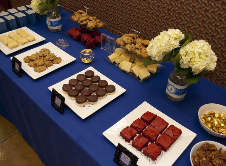 Blue accented retirement dessert table