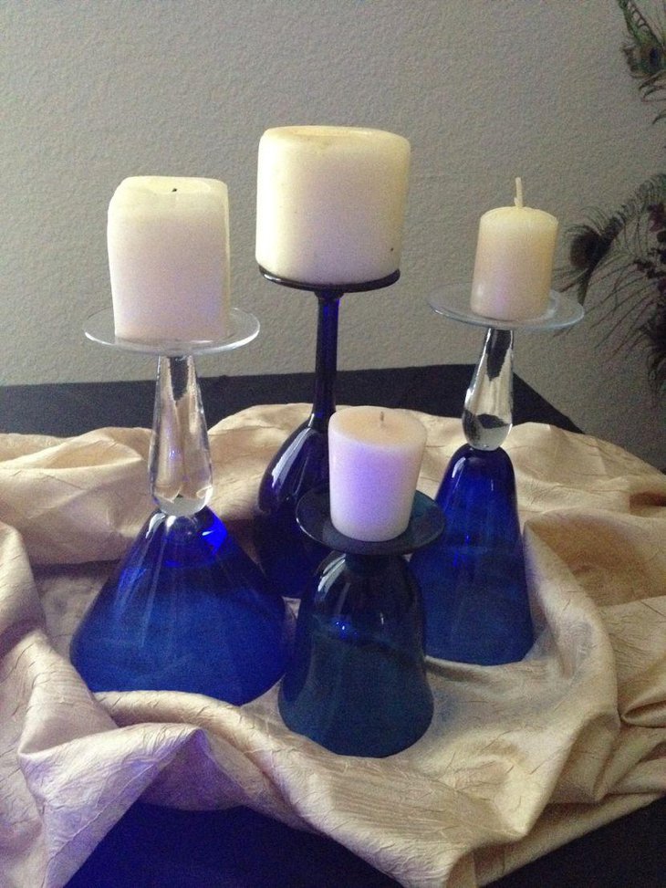 Blue Wine Glasses With Candles As Wedding Table Centerpiece